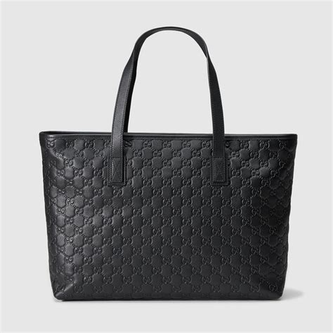 gucci black tote with leather handle|gucci embossed leather tote bag.